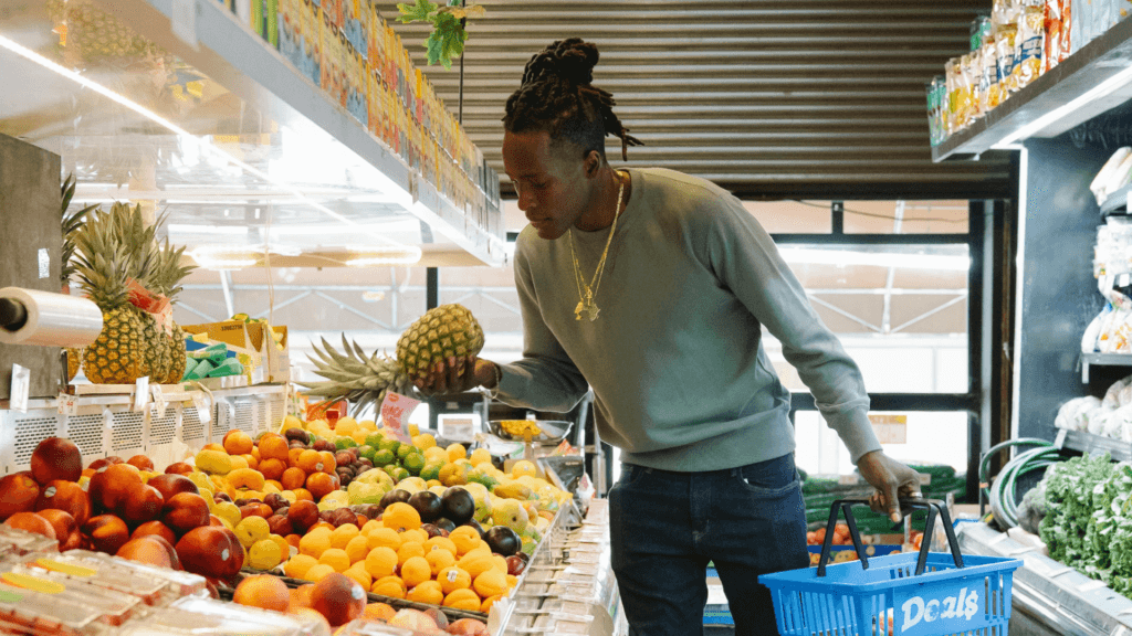 young man grocery shopping