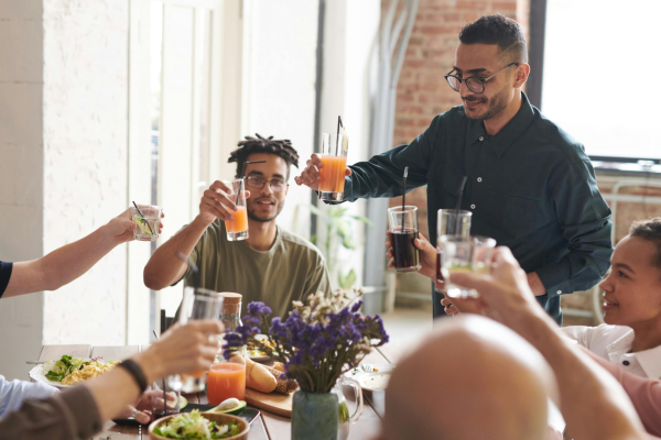 A group of friends and family at a dinner party